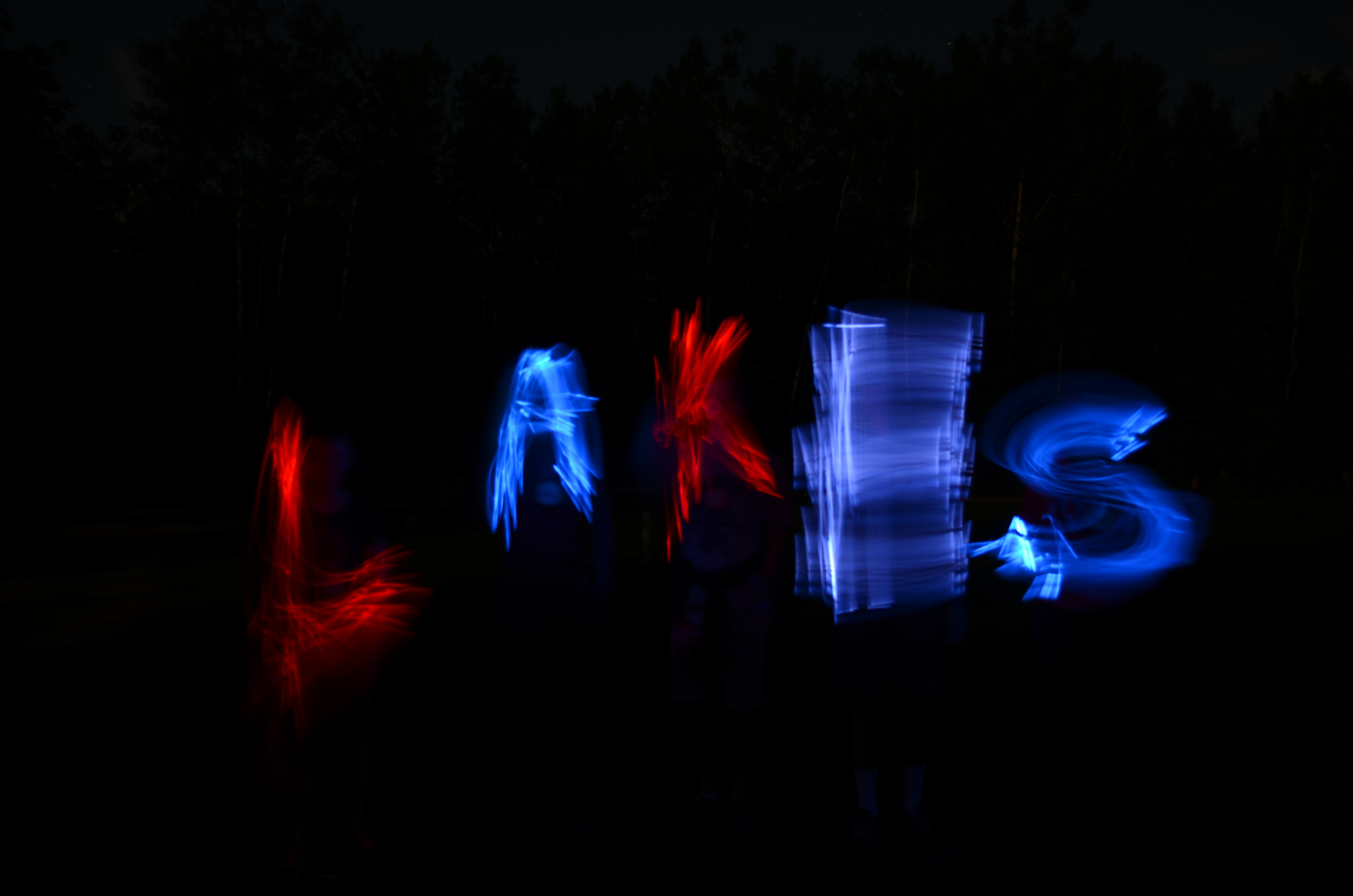 Glow in the dark photography with light-up items.